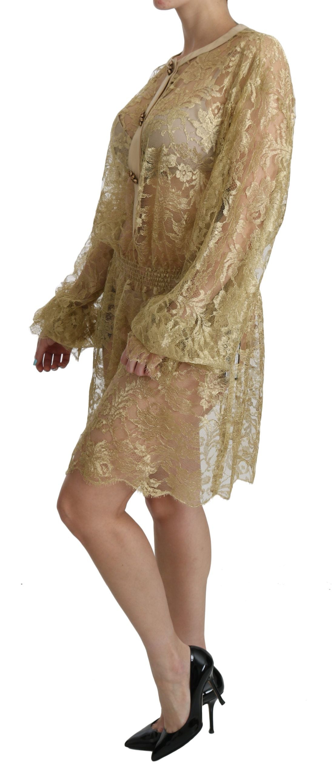 Robe en dentelle dorée Dolce & Gabbana à coupe évasée, longue au genou, transparente et élégante.