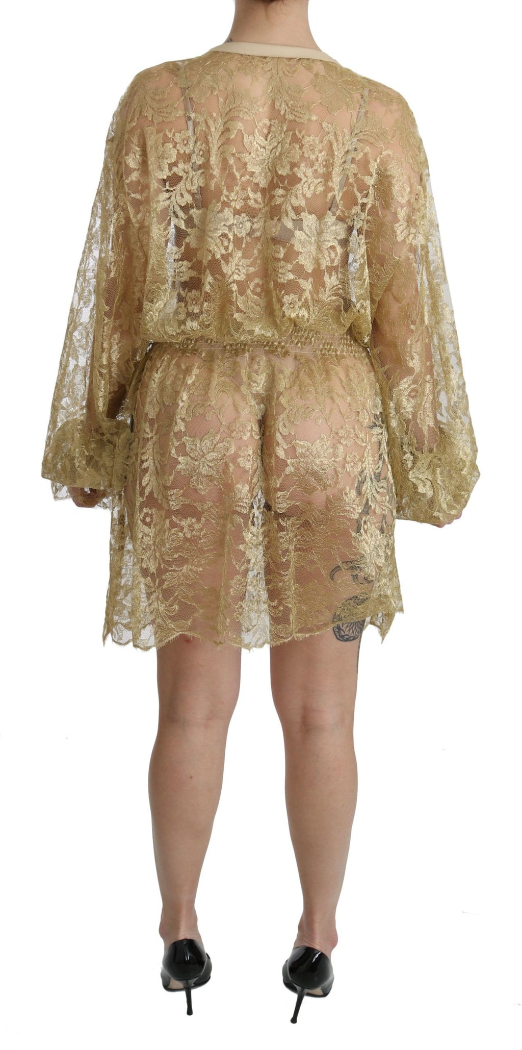 Robe longue en dentelle dorée Dolce & Gabbana, coupe évasée, longueur genou, transparente et élégante.
