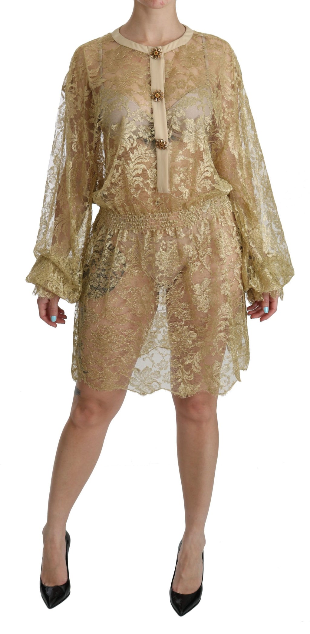 Robe dorée en dentelle transparente Dolce & Gabbana, coupe évasée, longueur au genou, élégante et raffinée.