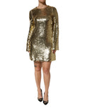 Robe courte Dolce & Gabbana en sequins dorés à manches longues, style élégant et brillante, vue de face sur fond blanc.