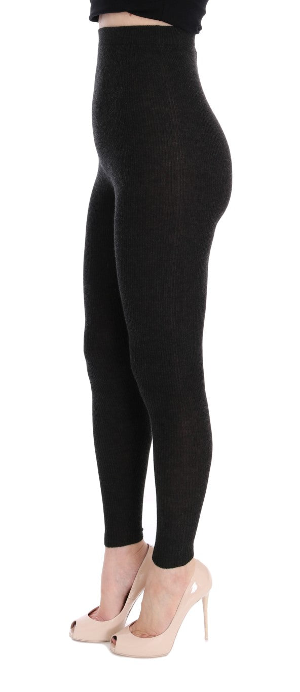 Jambes avec collants gris en cachemire extensible de Dolce & Gabbana, douceur et élégance pour un look sophistiqué.