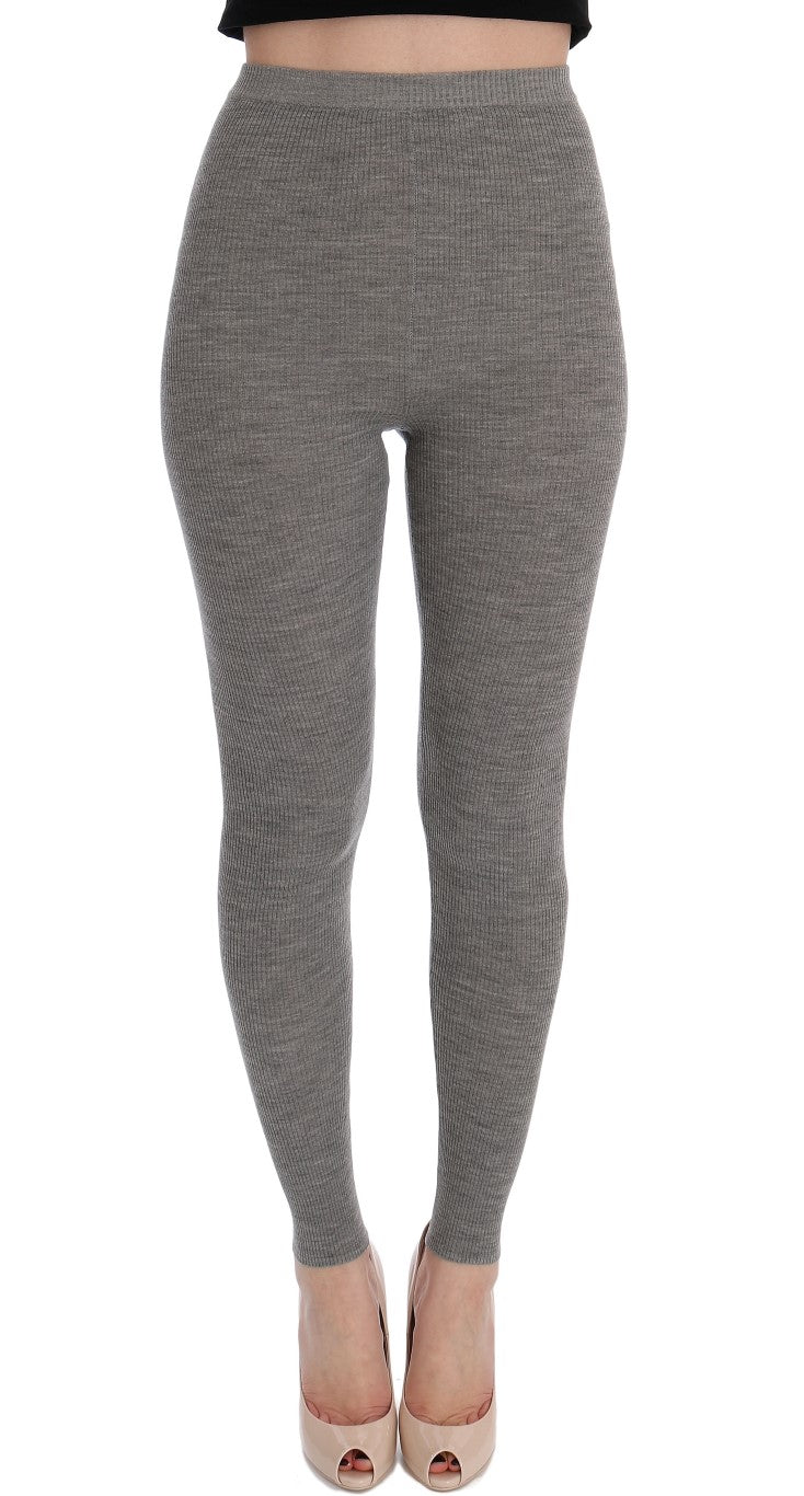 Collants gris en cachemire extensible de Dolce & Gabbana, détails élégants et texture douce visible sur l'image.