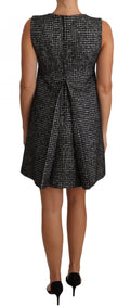Robe courte Dolce & Gabbana à motif pied-de-poule gris avec appliqué floral, style shift mini, élégante et tendance.