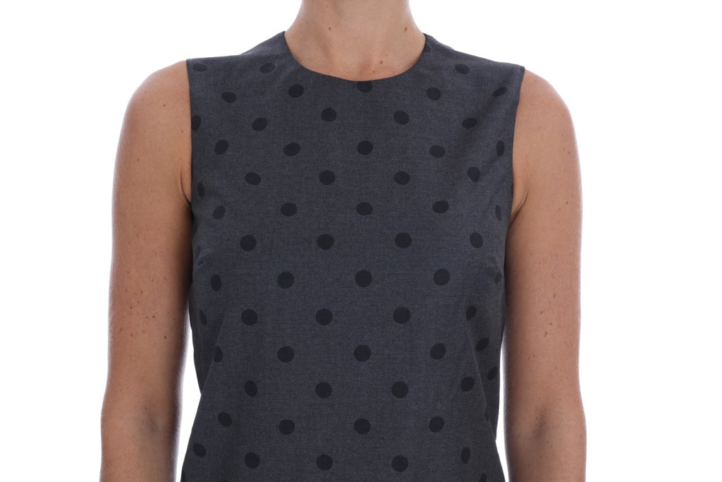 Robe fourreau en laine gris à pois Dolce & Gabbana, avec coupe élégante et motifs à pois sophistiqués.
