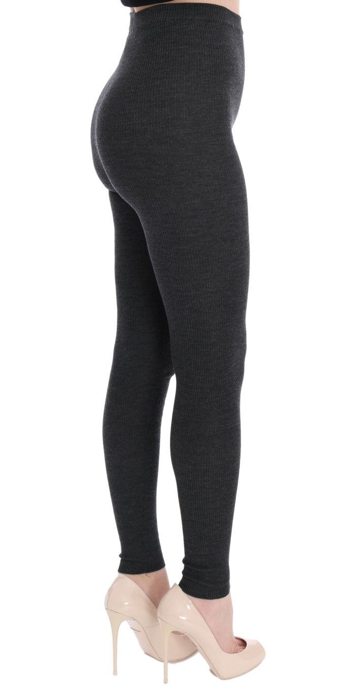 Collants en laine grise stretch de Dolce & Gabbana, élégants et confortables, visibles en gros plan sur l'image.