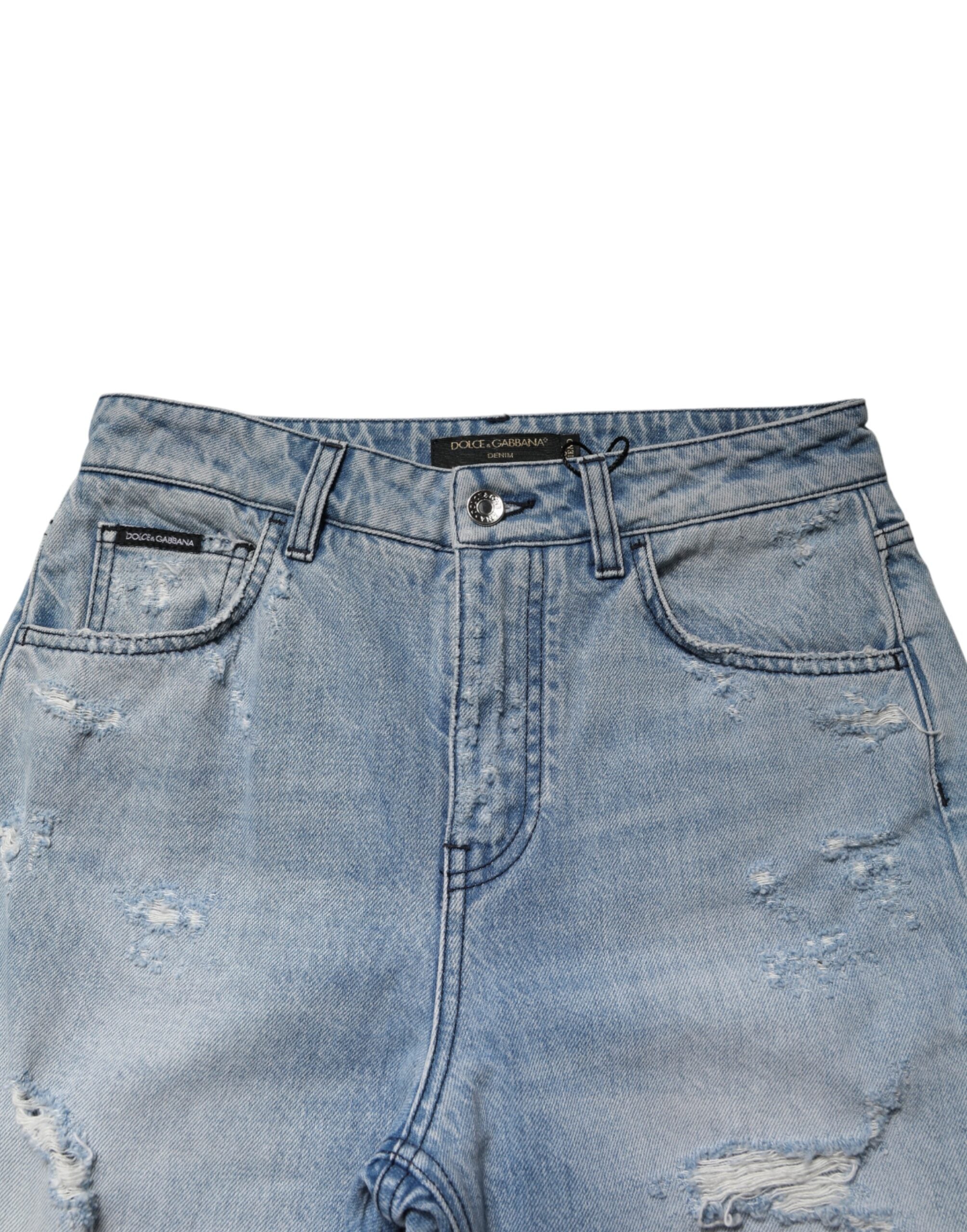 Jeans boyfriend déchirés et délavés Dolce & Gabbana LightBlue, coupe décontractée, détails usés visibles sur le denim.