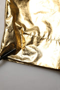 Pantalons dorés métalliques à taille haute et plis, style tapered, de la marque Dolce & Gabbana, visibles en gros plan.