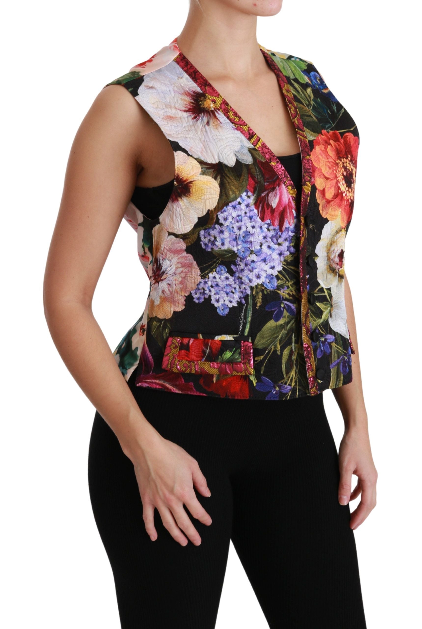 Haut sans manches Dolce & Gabbana à motif floral multicolore, veste cintrée élégante, en tissu léger et raffiné.