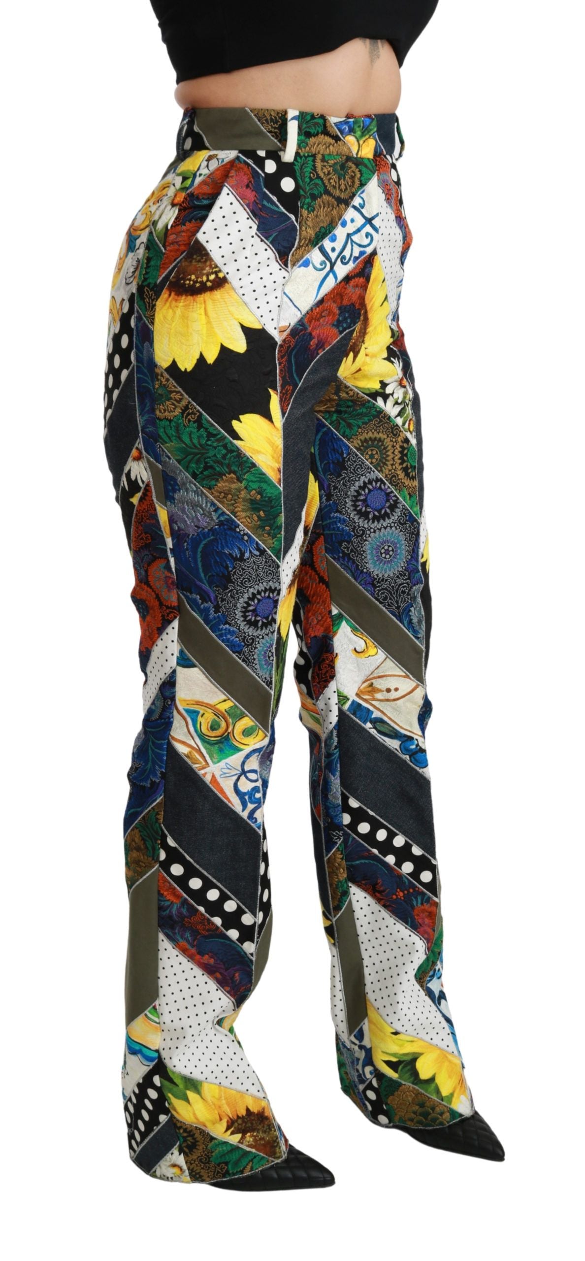 Pantalons Dolce & Gabbana à taille haute avec motif multicolore et coupe droite, visibles sur l'image.