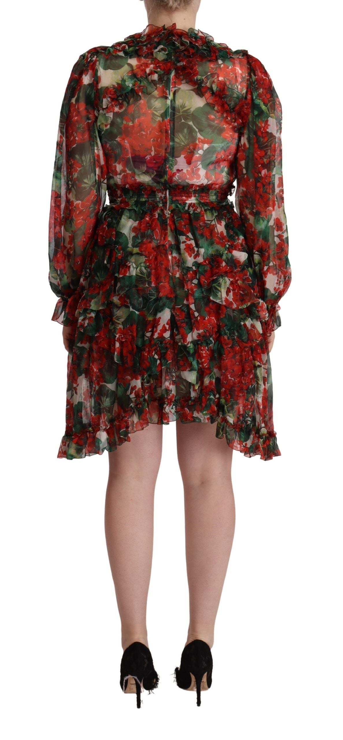 Robe longue en soie Dolce & Gabbana à fleurs multicolores et rouges, style maxi, avec un design élégant et sophistiqué.
