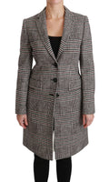 Manteau trench long multicolore Dolce & Gabbana pour femme, coupe au genou, avec ceinture et détails élégants.