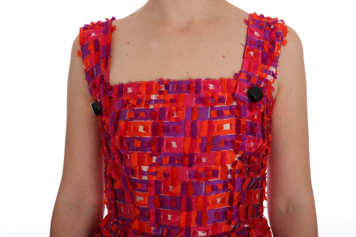 Robe trapèze Dolce & Gabbana rose à motifs colorés, longueur au-dessus du genou, en tissu léger et élégant.