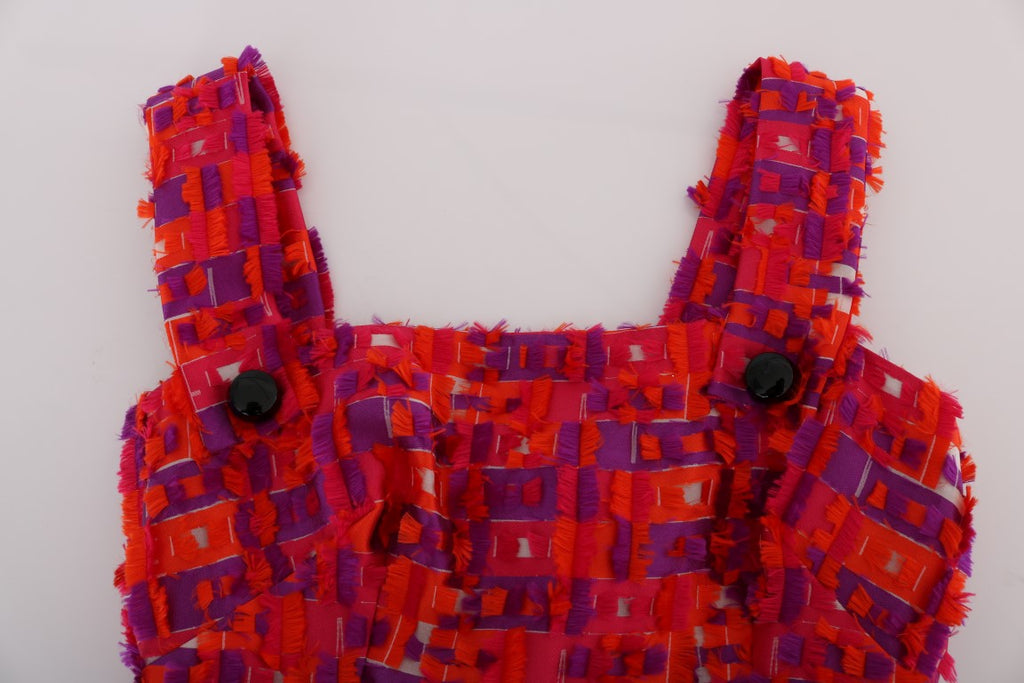 Robe rose à motif Dolce & Gabbana, coupe évasée au-dessus du genou, style élégant et féminin, en tissu léger.