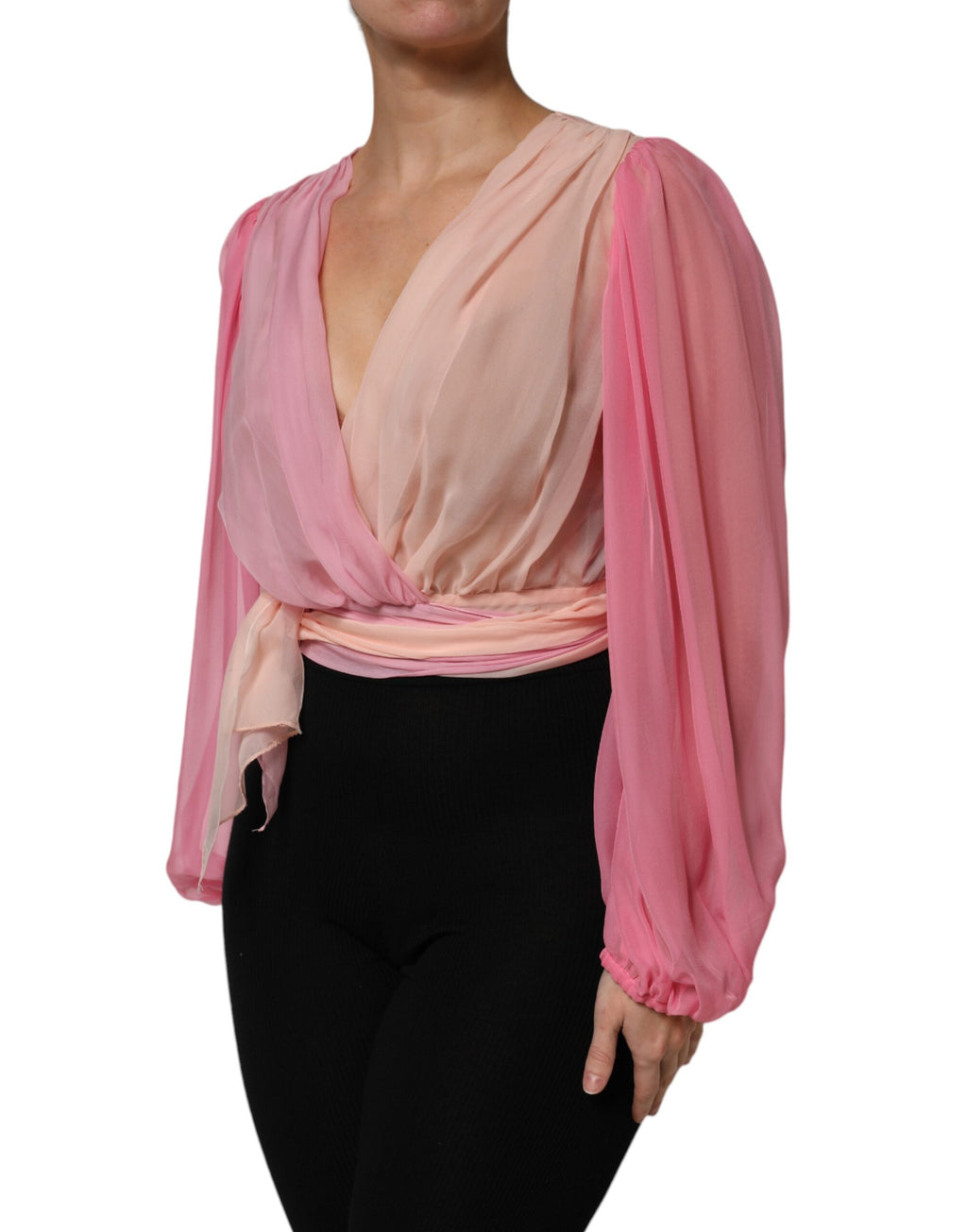 Blouse longue Dolce & Gabbana rose à décolleté plongeant en V et manches longues, élégant haut en tissu fluide.