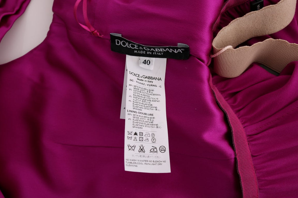 Robe longue en soie rose Dolce & Gabbana, robe droite stretch élégante avec détails sophistiqués, vue de face.