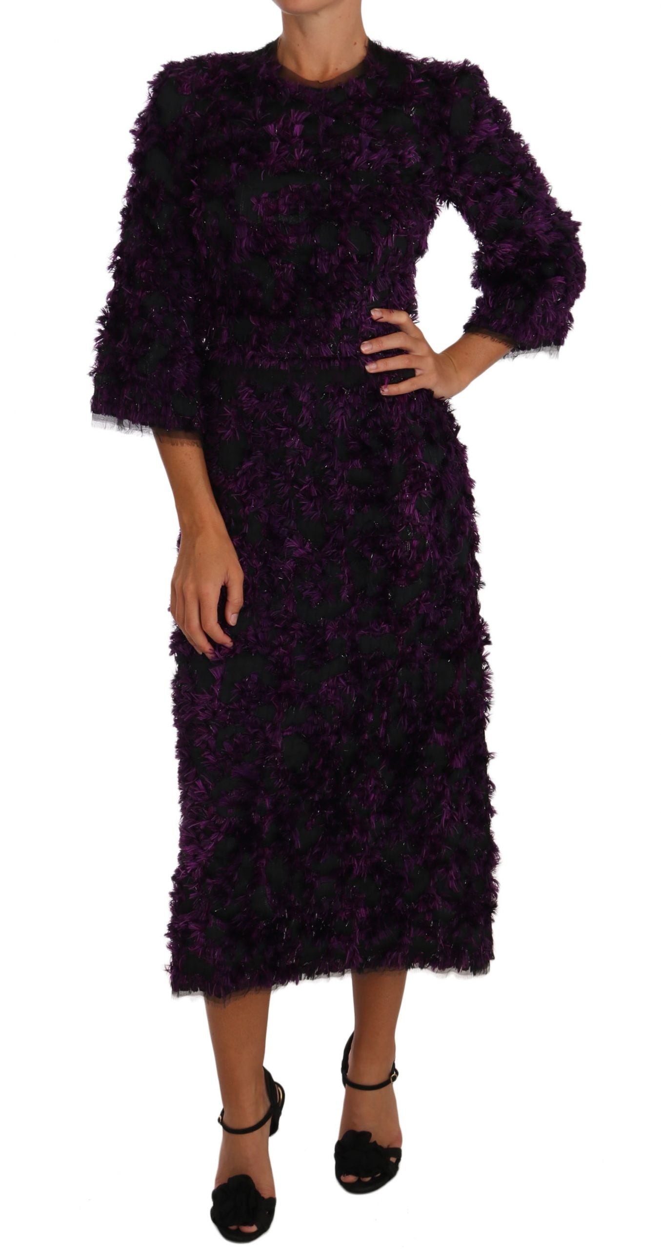 Robe midi moulante Dolce & Gabbana violette avec franges, style élégant et féminin, visible sur cette image.
