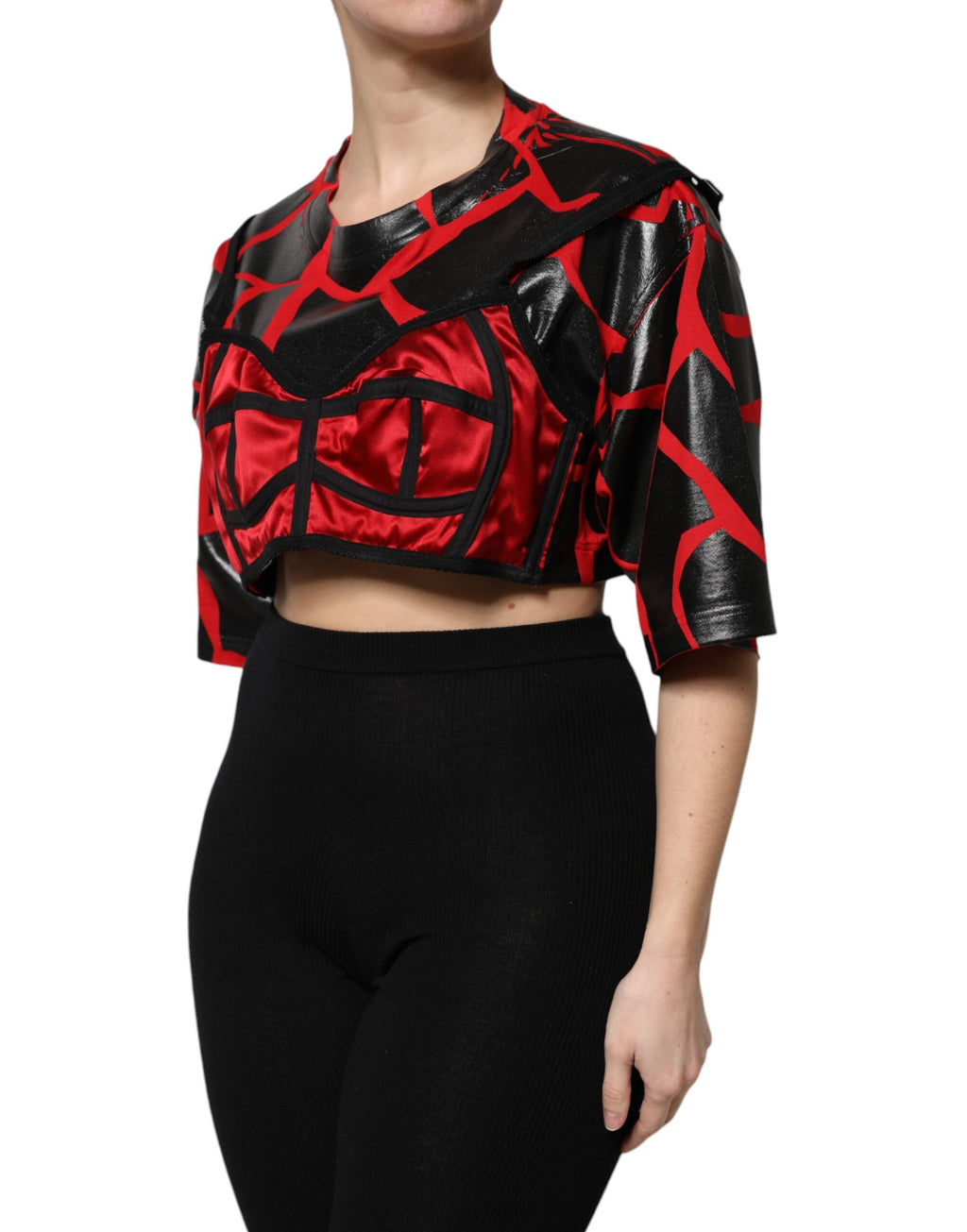 Bustier rouge et noir en coton de Dolce & Gabbana, top court avec détails élégants, mode féminine sophistiquée.