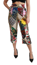 Pantalon cropped en soie Dolce & Gabbana à taille haute avec imprimé multicolore, coupe élégante et moderne.