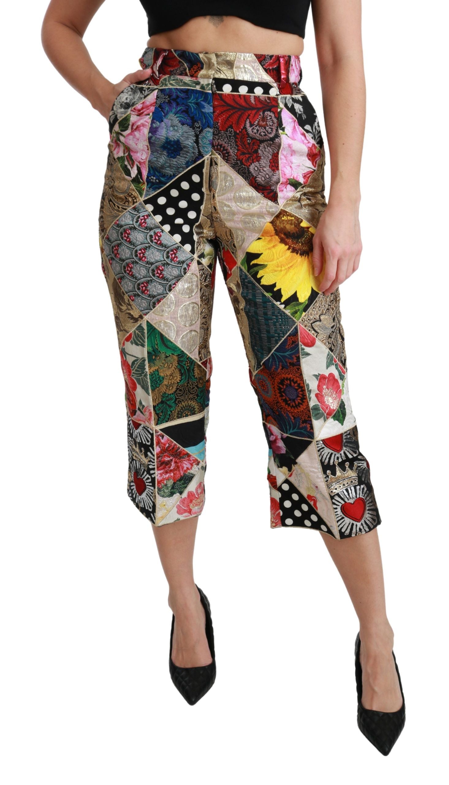 Pantalon cropped en soie Dolce & Gabbana à taille haute avec imprimé multicolore, coupe élégante et moderne.