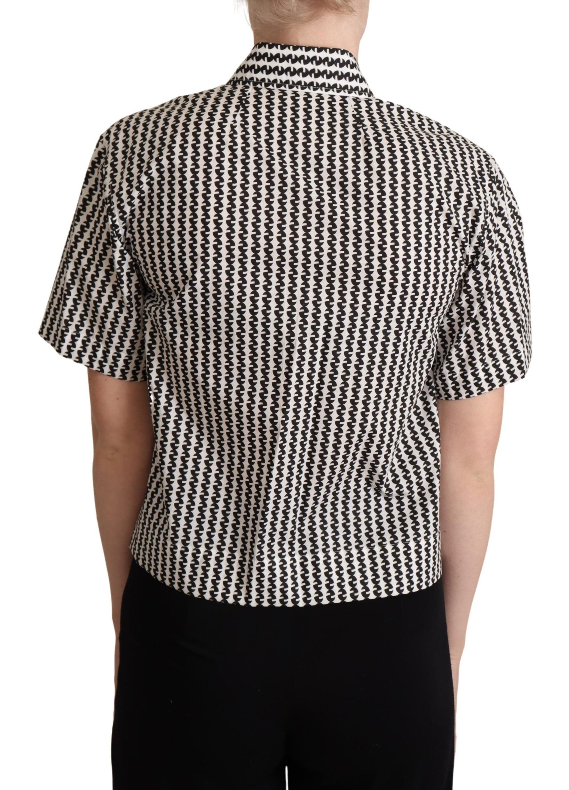 Chemise Dolce & Gabbana à motif fantasy blanc et noir, avec détails élégants et design sophistiqué.