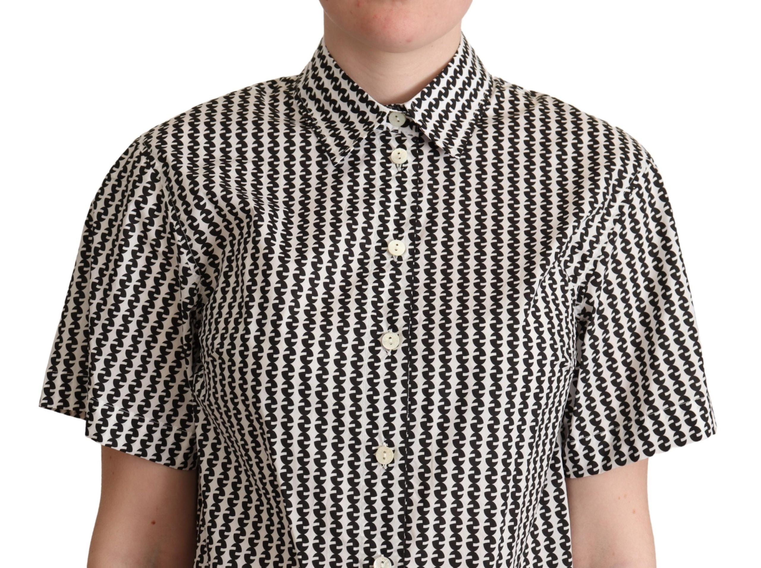 Chemise blanche et noire Dolce & Gabbana avec motif fantasie, détails élégants et coupe moderne.