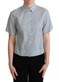 Chemise en coton blanche à pois bleus de Dolce & Gabbana, style élégant et classique avec col et manches longues.