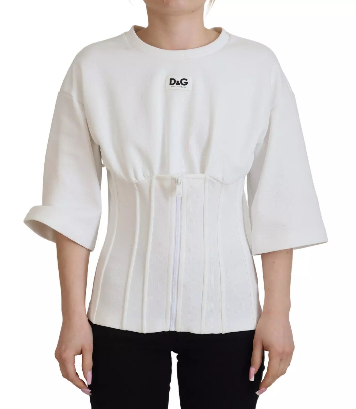 Corset stretch blanc en coton de Dolce & Gabbana, top ajusté avec détails élégants, porté comme t-shirt.