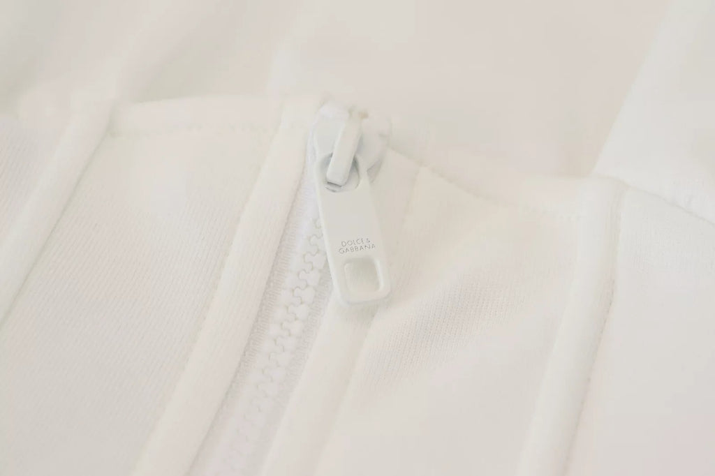 Corset blanc en coton de Dolce & Gabbana, top stretch ajusté, avec détails élégants, parfait pour un look sophistiqué.