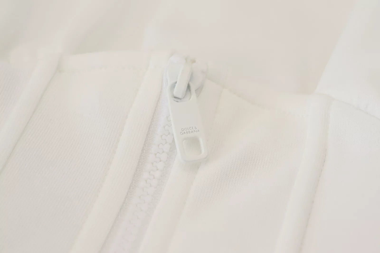 Corset blanc en coton de Dolce & Gabbana, top stretch ajusté, avec détails élégants, parfait pour un look sophistiqué.