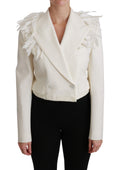 Manteau en laine blanc à double boutonnage Dolce & Gabbana, veste élégante, coupe classique, détails sophistiqués.
