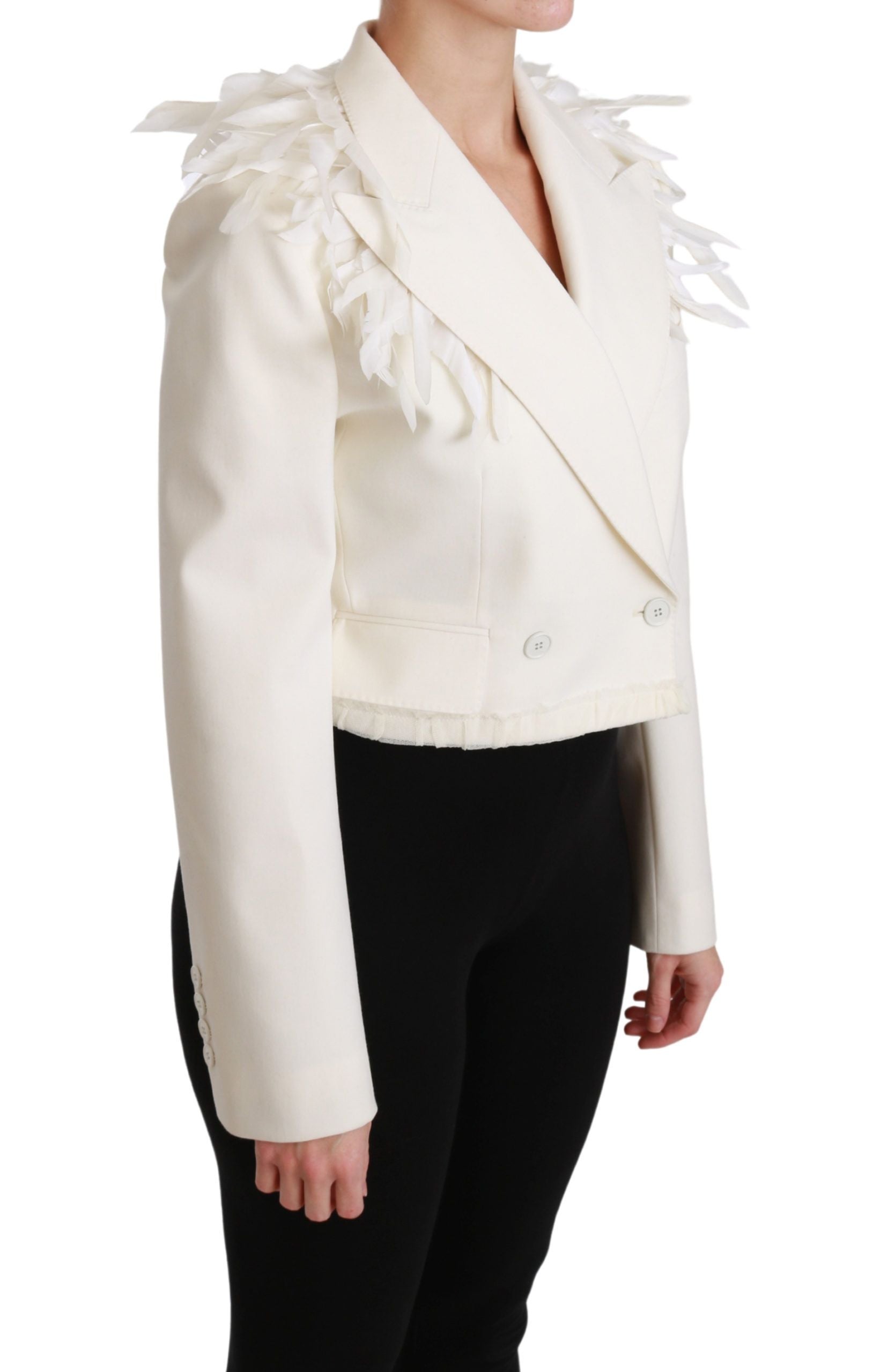 Manteau blanc en laine Dolce & Gabbana à double boutonnage, élégant et chaud, porté sur un mannequin.