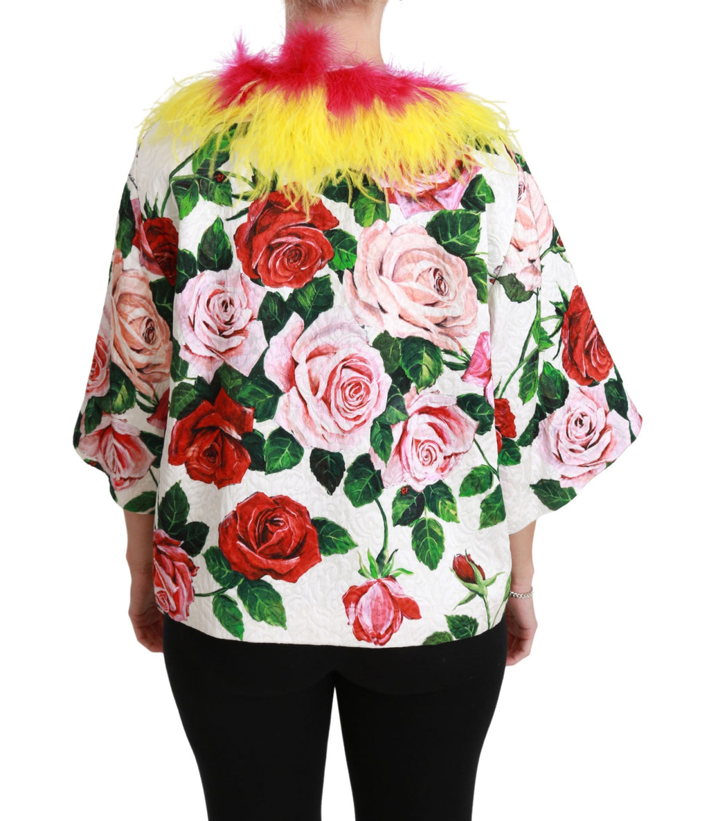 Veste blanche Dolce & Gabbana à fleurs avec col en fourrure et roses, style élégant et féminin.