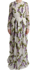 Robe maxi blanche Dolce & Gabbana à broderie florale élégante, vêtement féminin avec détails sophistiqués.