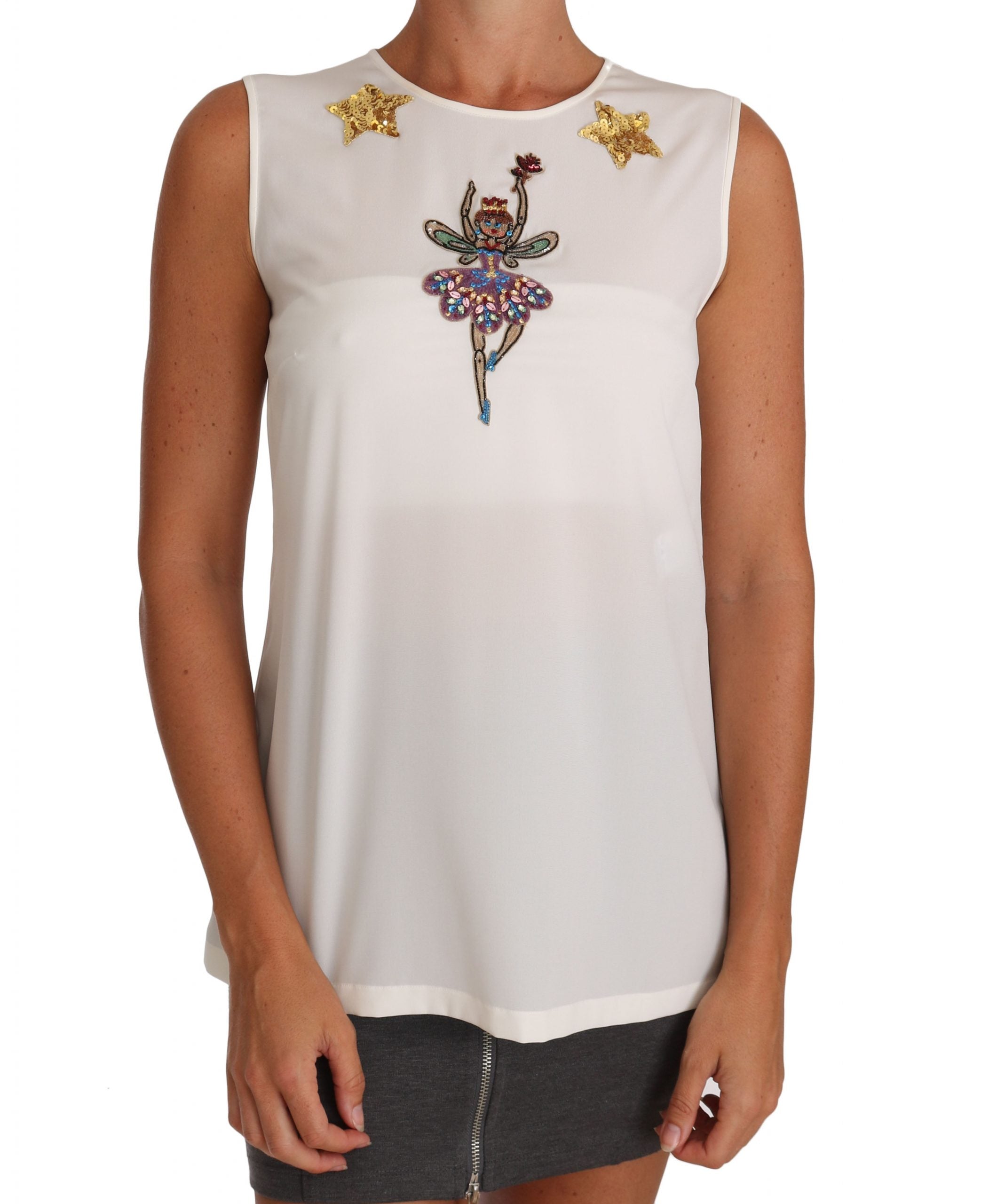 Haut de fairy en soie blanche Dolce & Gabbana avec embellissements de cristaux et sequins, détails élégants et raffinés.