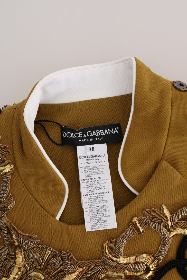 Veste sans manches Dolce & Gabbana jaune avec croix en cristaux, style élégant et sophistiqué.