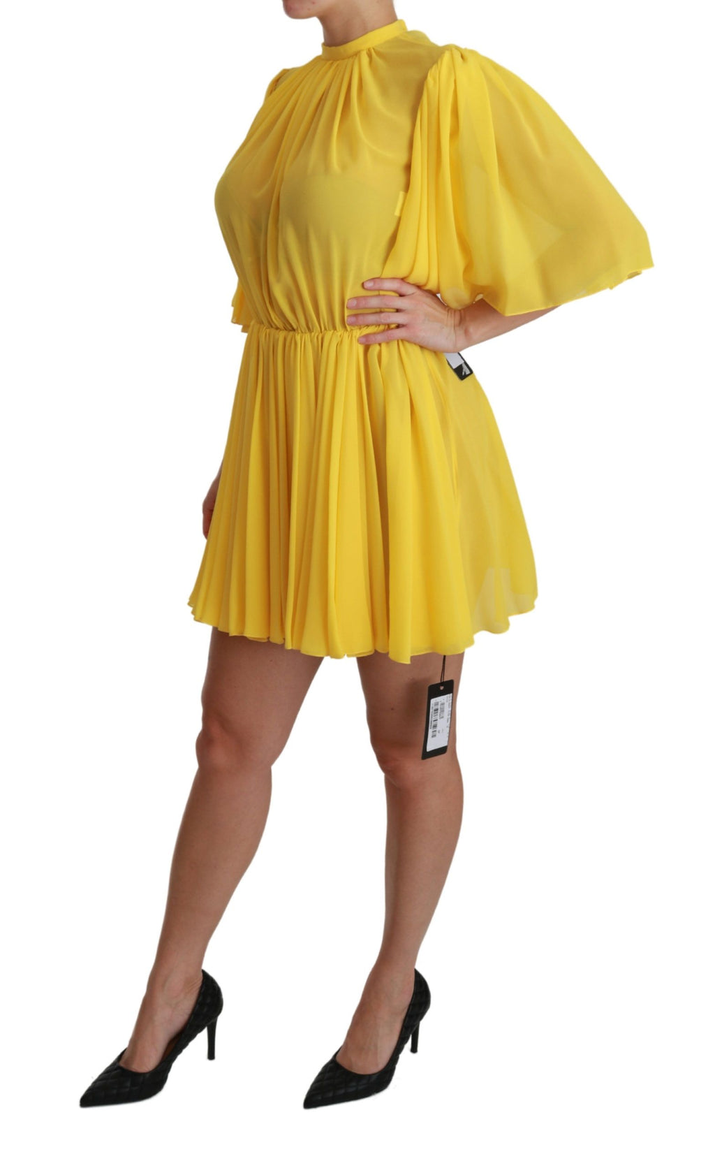 Robe courte jaune en soie plissée à coupe évasée de Dolce & Gabbana, style élégant et féminin.