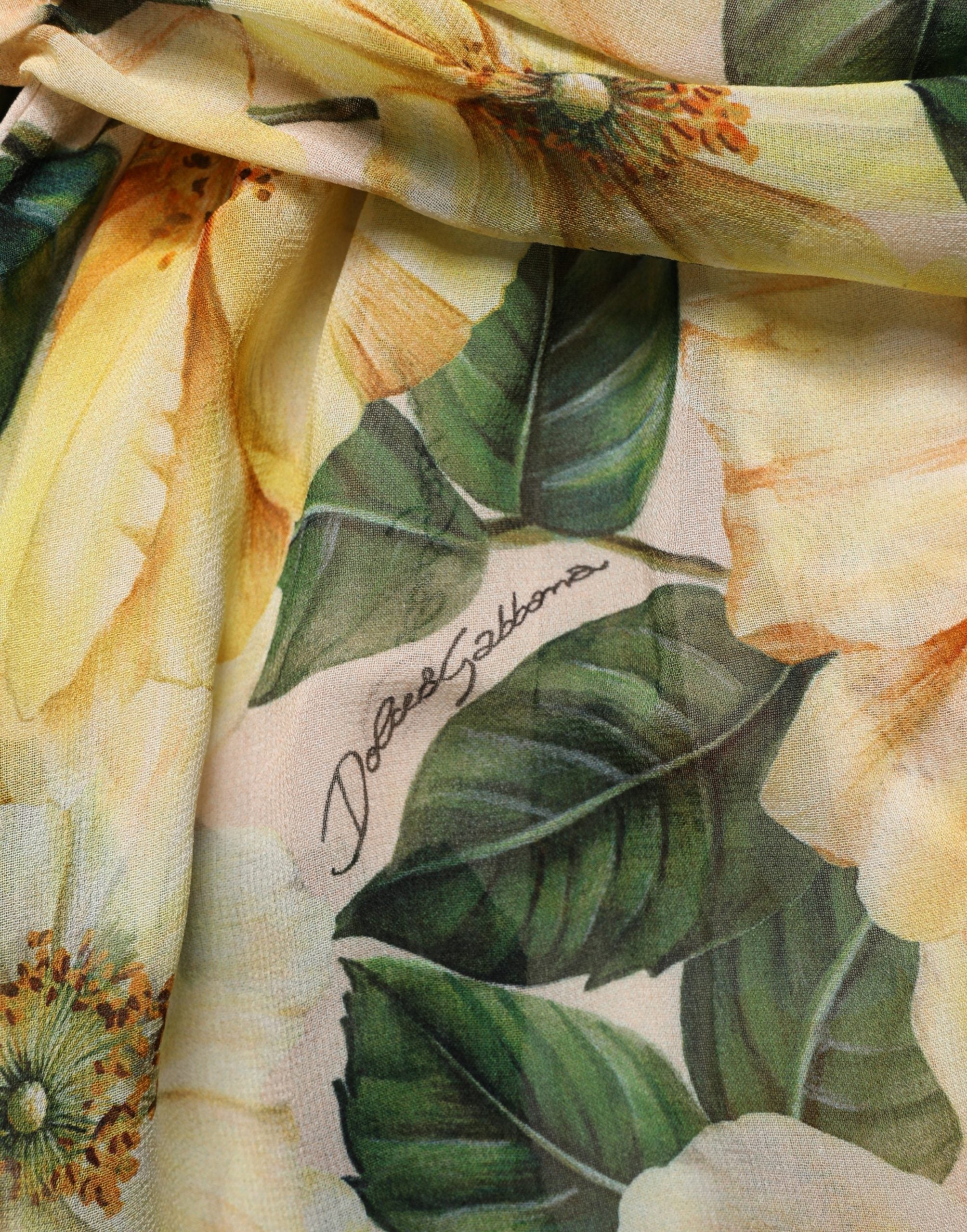 Robe longue plissée en soie jaune à imprimé floral Dolce & Gabbana, élégante et fluide, pour femmes.
