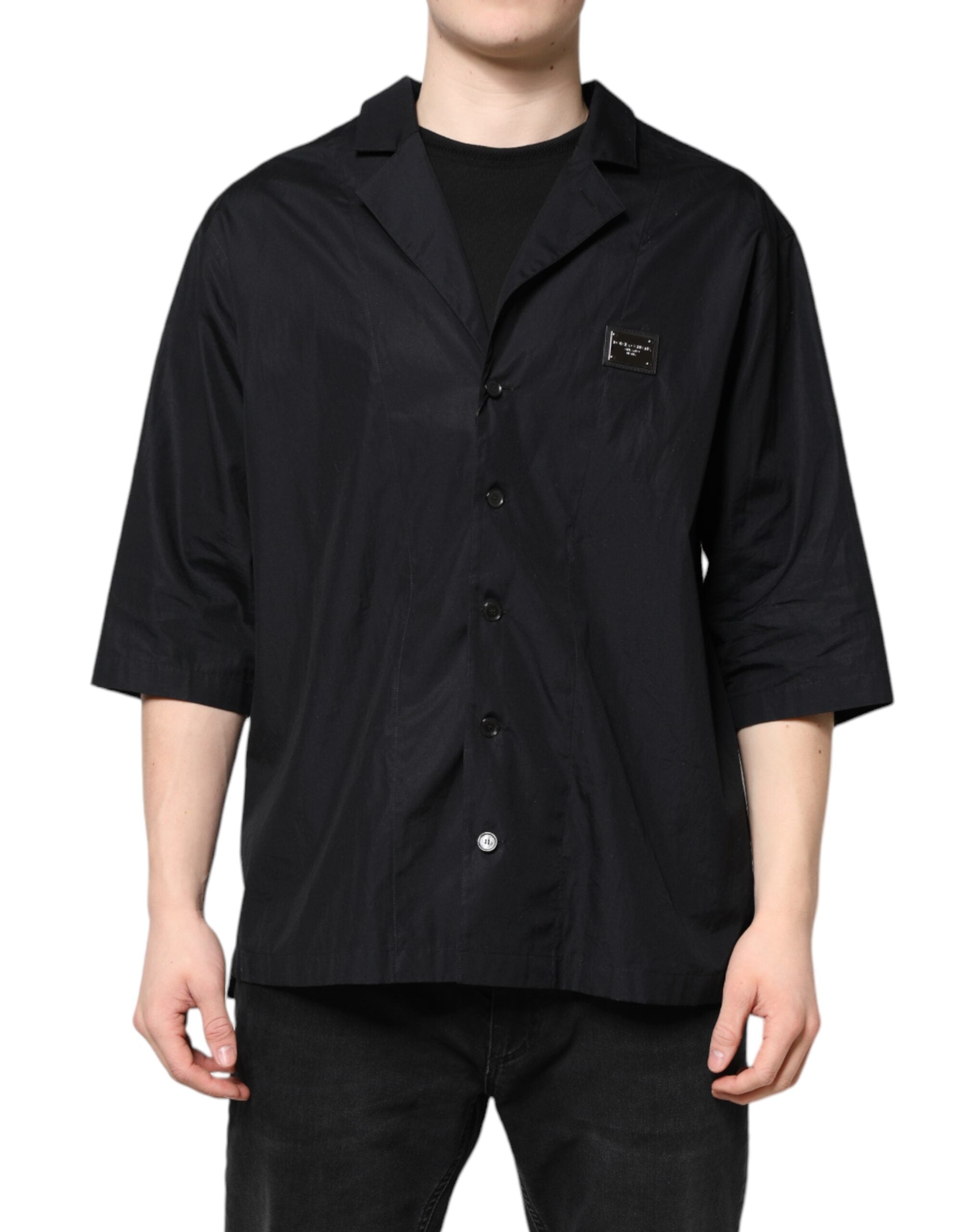Chemise décontractée à manches courtes Dolce & Gabbana noire avec boutons, tissu léger et style élégant.