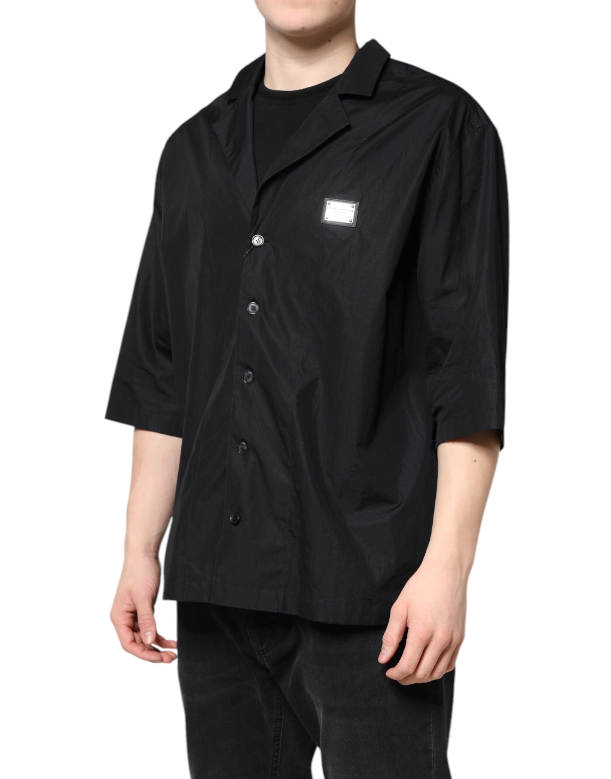 Chemise décontractée à manches courtes noir Dolce & Gabbana avec boutons, tissu léger, style casual élégant.