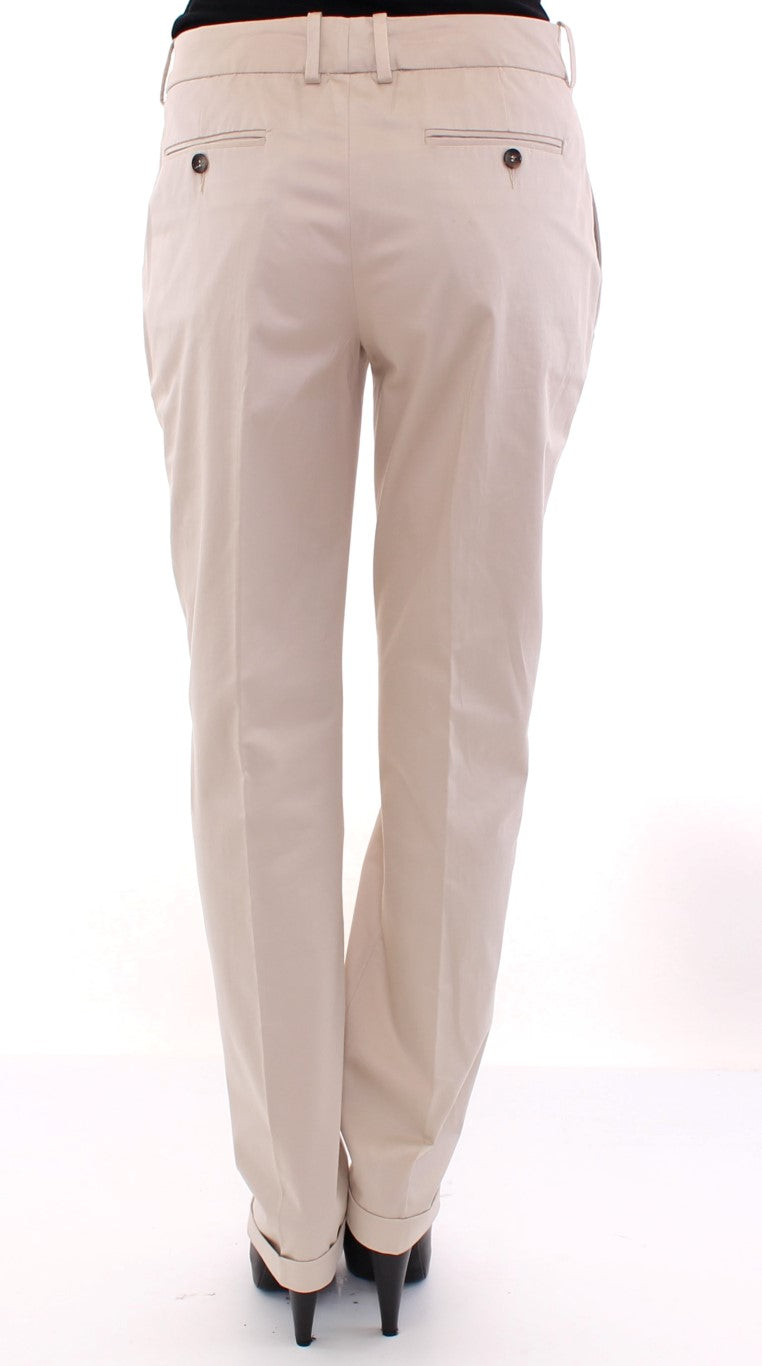 Pantalon chino beige en coton de Dolce & Gabbana, style élégant avec coupe classique, visible en gros plan sur le produit.