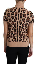 Pull en laine vierge beige avec motif léopard Dolce & Gabbana, col roulé élégant et confortable.