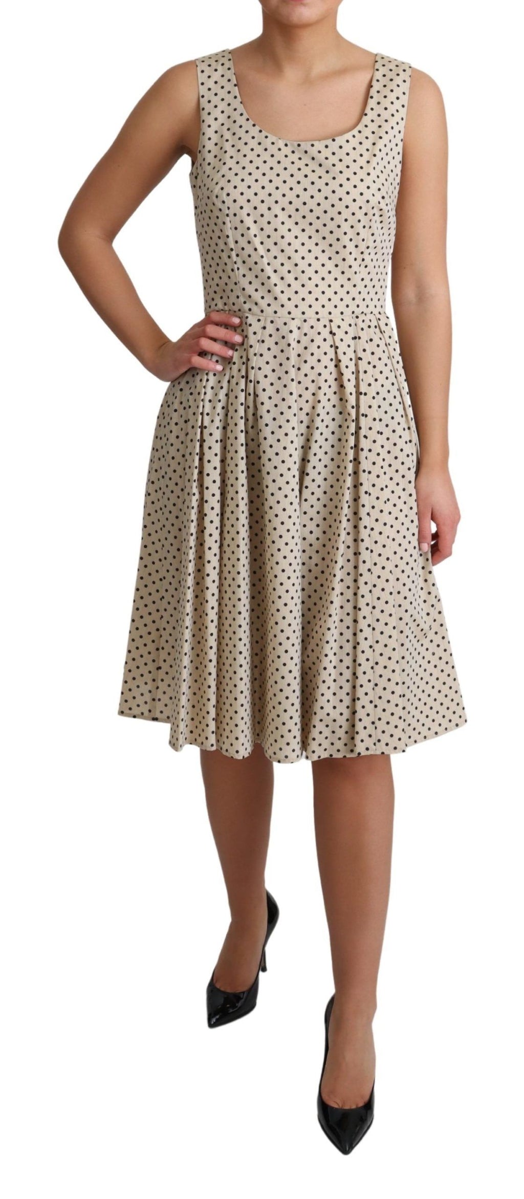 Robe beige à pois en coton Dolce & Gabbana, coupe en ligne A avec motifs à pois élégants.