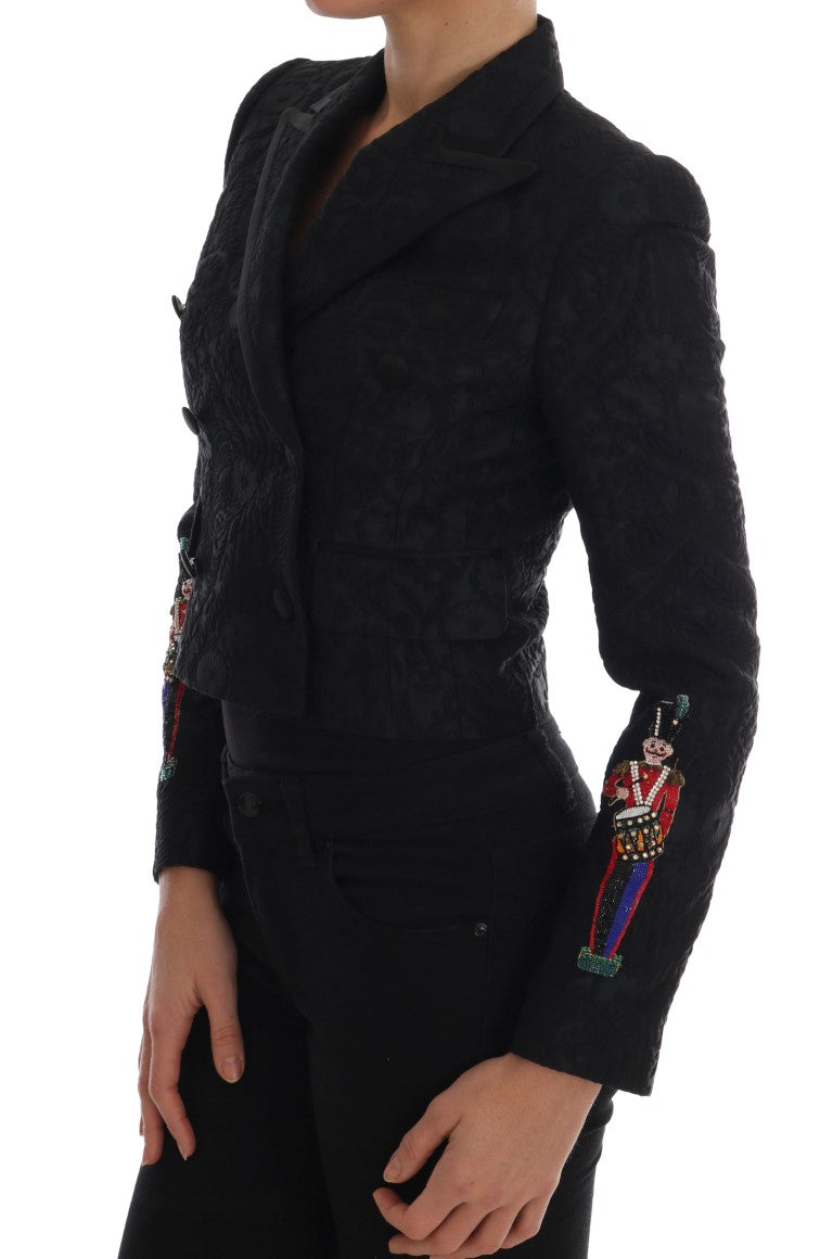 Veste blazer en brocart noir de Dolce & Gabbana, coupe élégante avec détails sophistiqués, vue de face sur fond neutre.