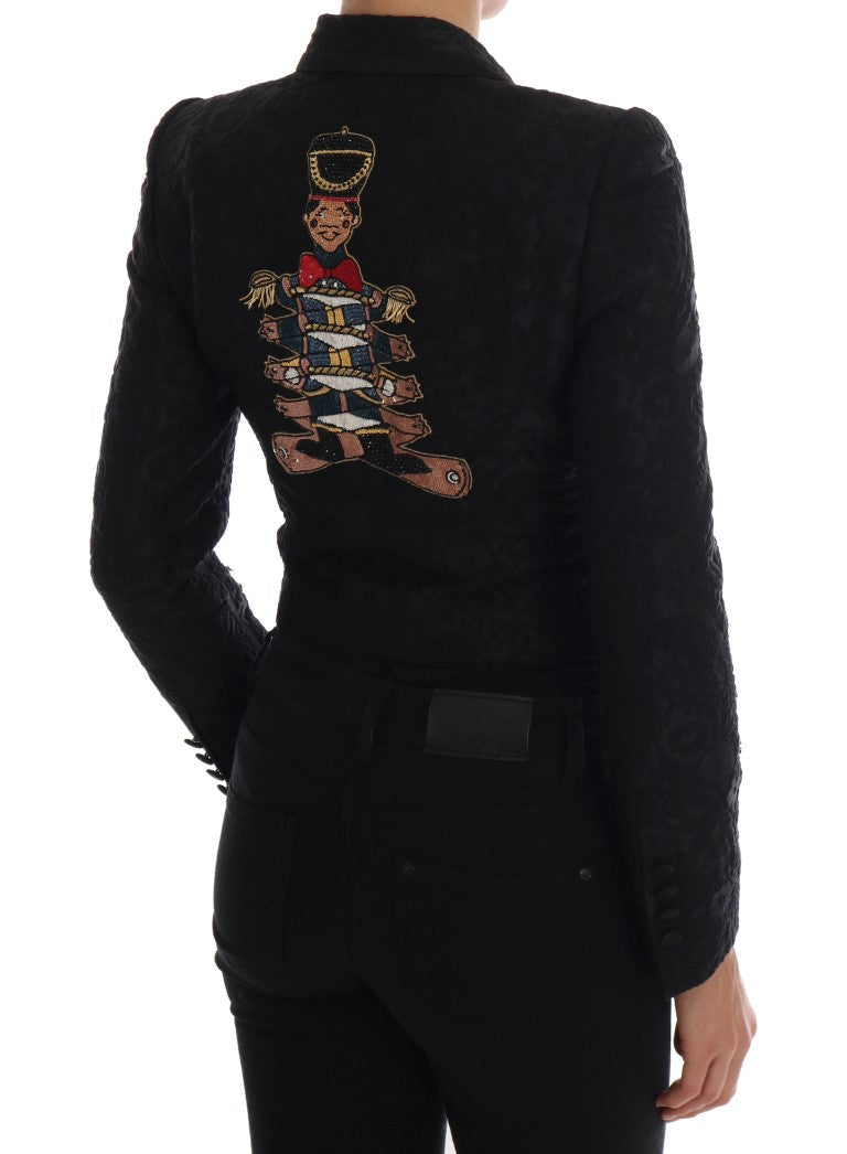 Veste blazer Dolce & Gabbana en brocart noir, coupe élégante et détails sophistiqués, vue de face sur un fond neutre.