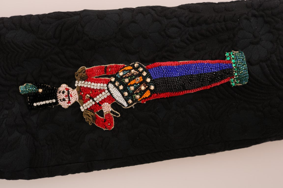 Veste blazer en brocart noir Dolce & Gabbana, élégante et sophistiquée, visible avec détails de broderie et coupe moderne.