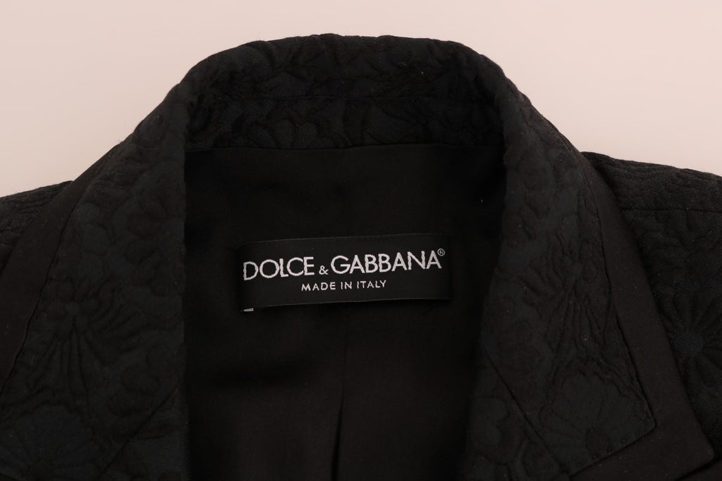 Veste blazer Dolce & Gabbana en brocart noir avec détails élégants, vue de face sur un fond neutre.