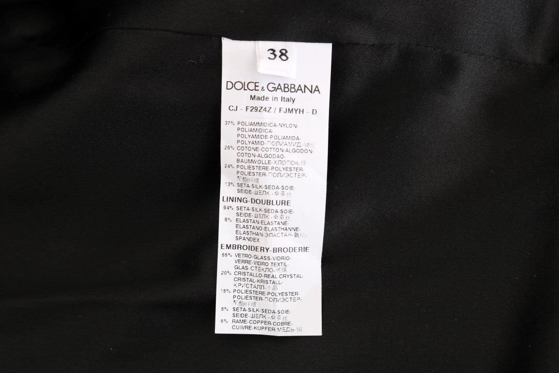 Veste blazer en brocart noir Dolce & Gabbana avec détails élégants et coupe sophistiquée, vue de face sur fond neutre.