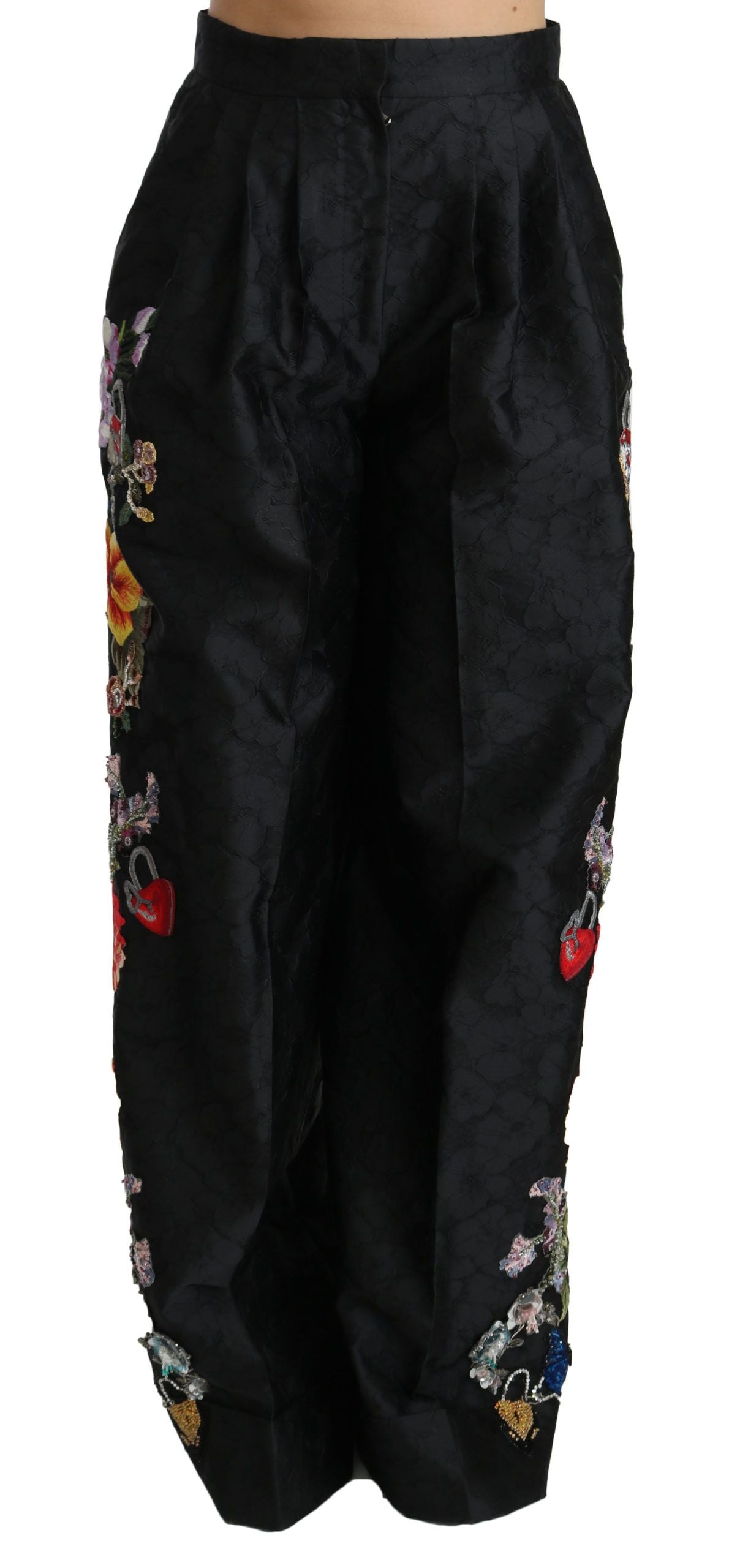 Pantalons noirs en brocart floral avec sequins et perles de Dolce & Gabbana, détails élégants et sophistiqués.