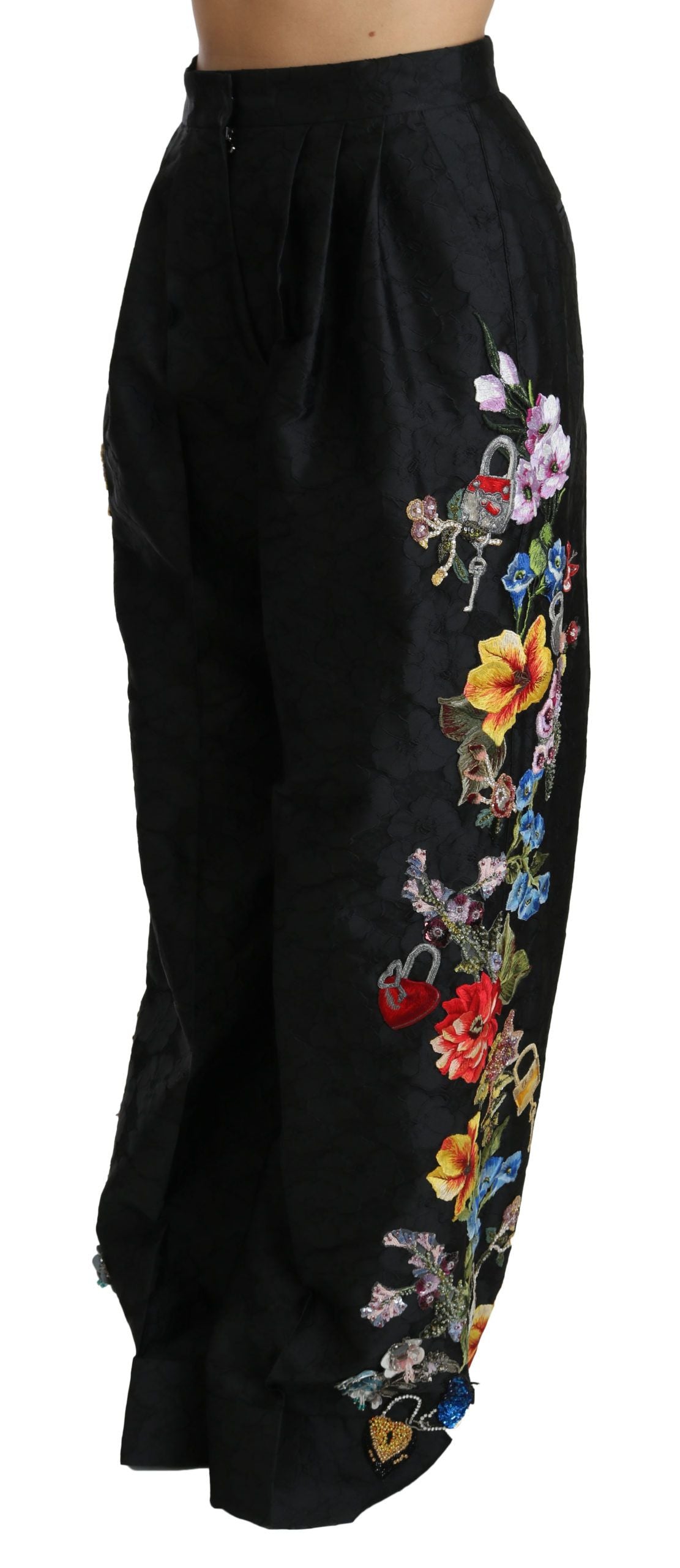 Pantalon Dolce & Gabbana en brocart noir à fleurs brodées, sequins et perles, élégant et détaillé.