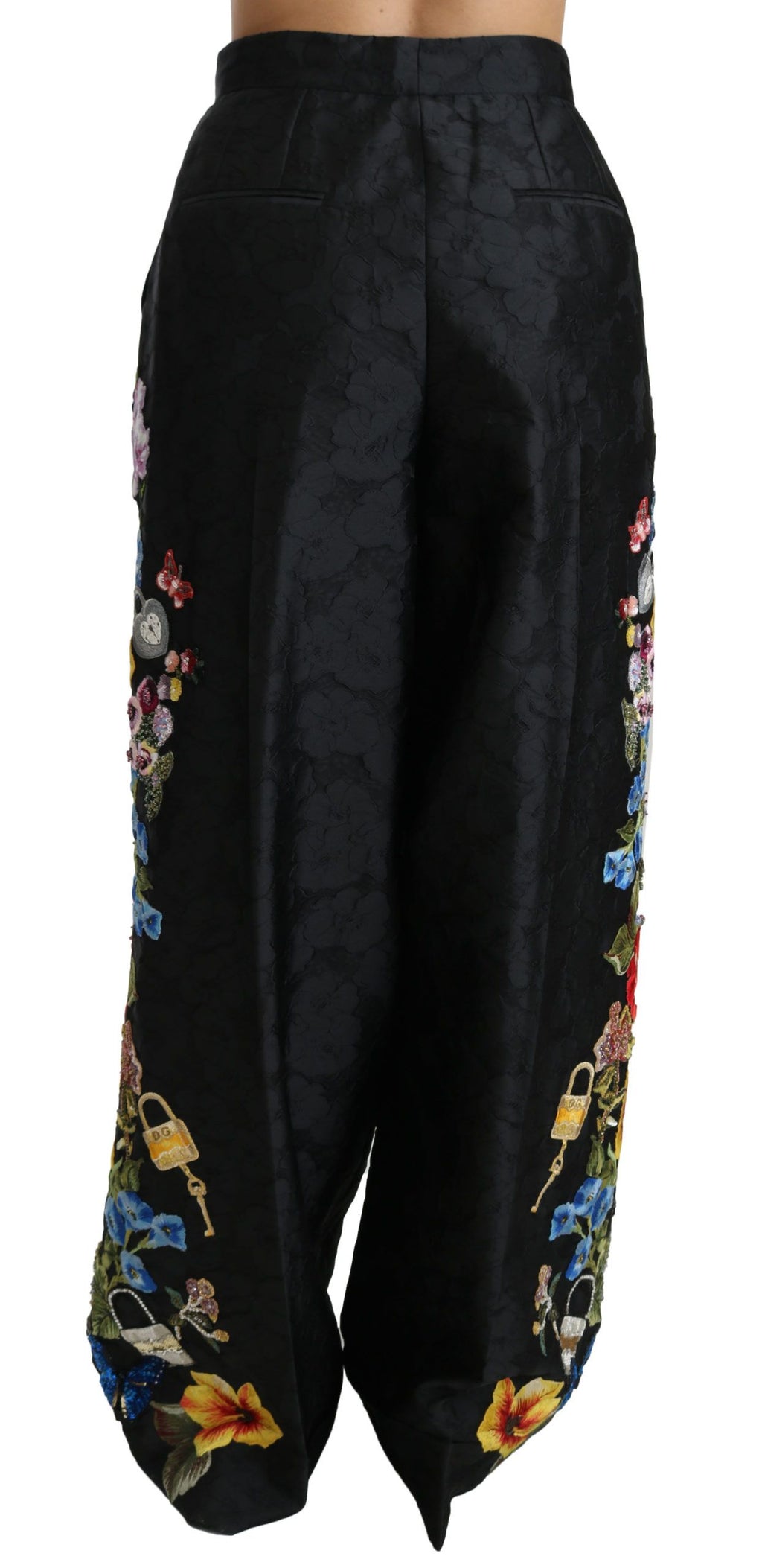Pantalon noir brocart floral avec sequins et perles Dolce & Gabbana, détails élégants et finition sophistiquée.